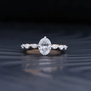Oval Diamond Ring With Marquise Side Stones