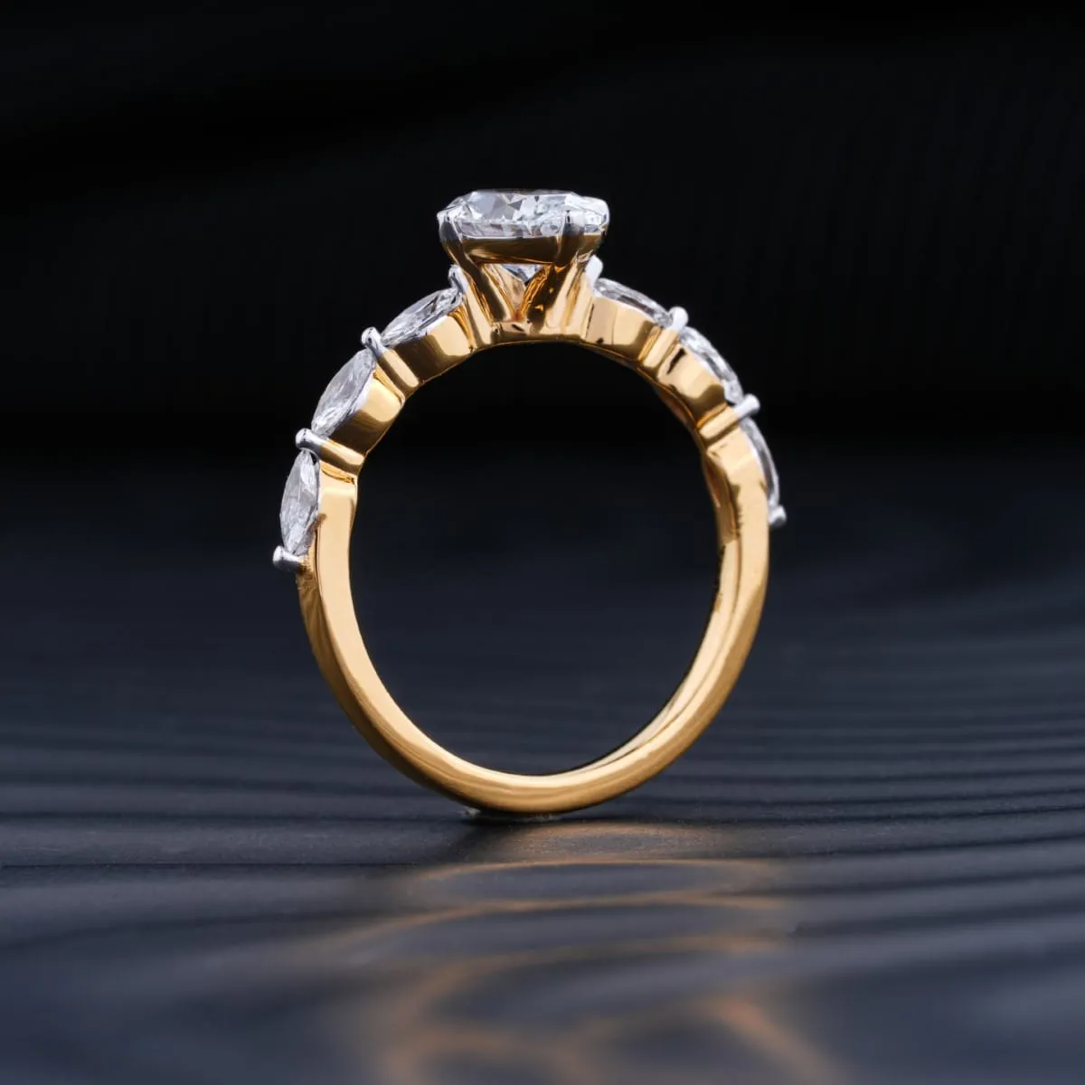 Oval Diamond Ring With Marquise Side Stones