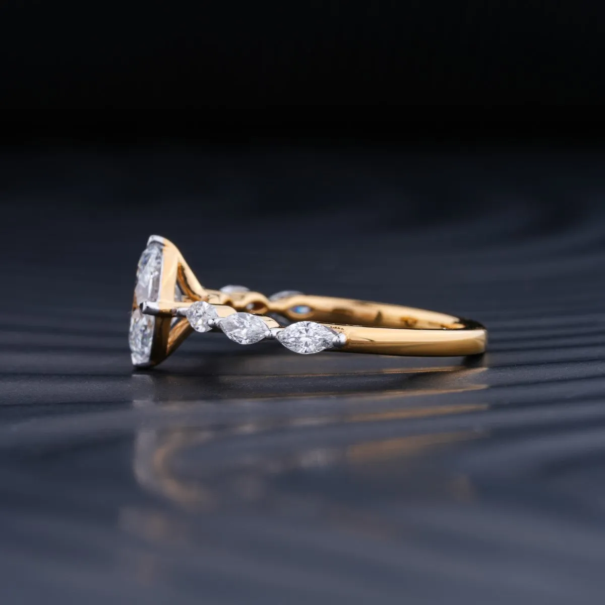 Oval Diamond Ring With Marquise Side Stones