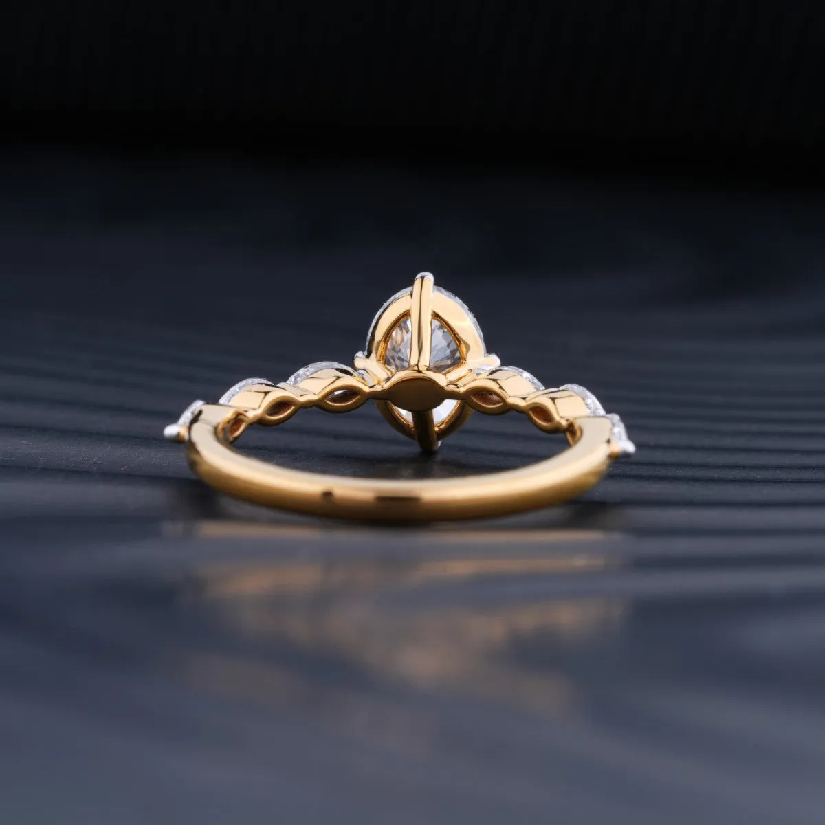 Oval Diamond Ring With Marquise Side Stones